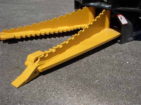 skid steer attachments tree puller